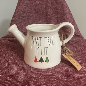 Rae Dunn “That Tree is Lit” ceramic watering can planter.